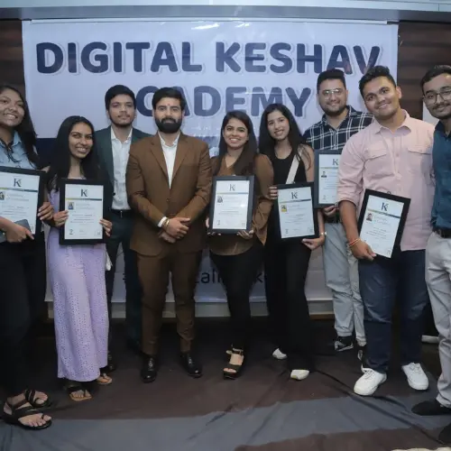 A group of proud graduates holding certificates at a Digital Keshav Academy event, celebrating their achievements after completing the digital marketing course in Surat at the top-rated digital marketing institute in Surat.
